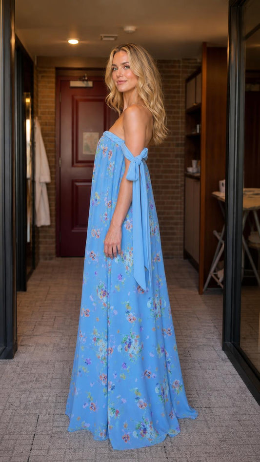 Side profile of blue floral maxi dress with tie sleeves