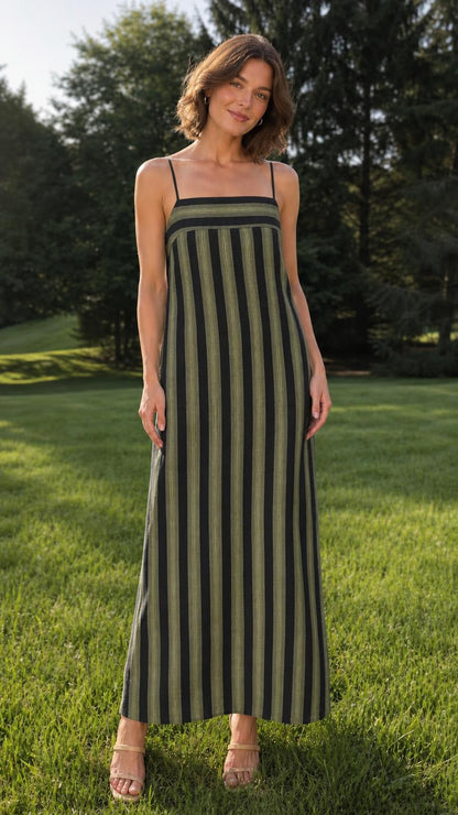 Woman wearing green striped maxi dress