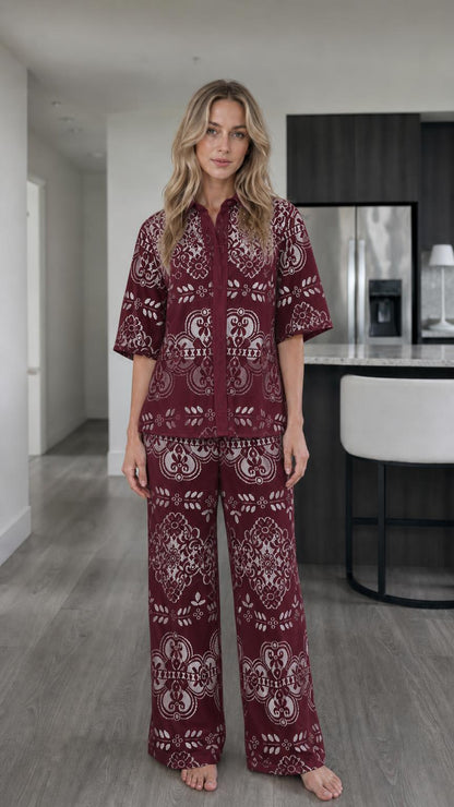 Woman wearing burgundy floral lace two-piece matching set